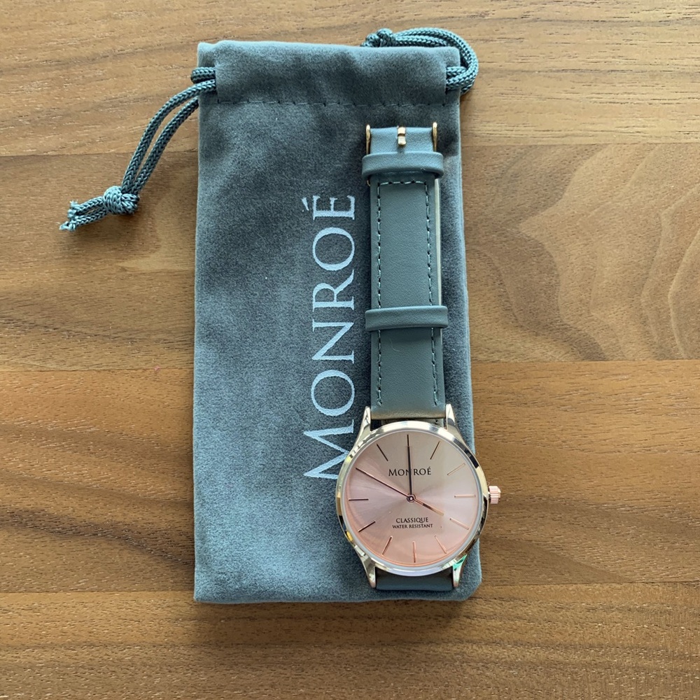 Monroe Ladies Watch. Grey leather band, case polished. Quartz movement.